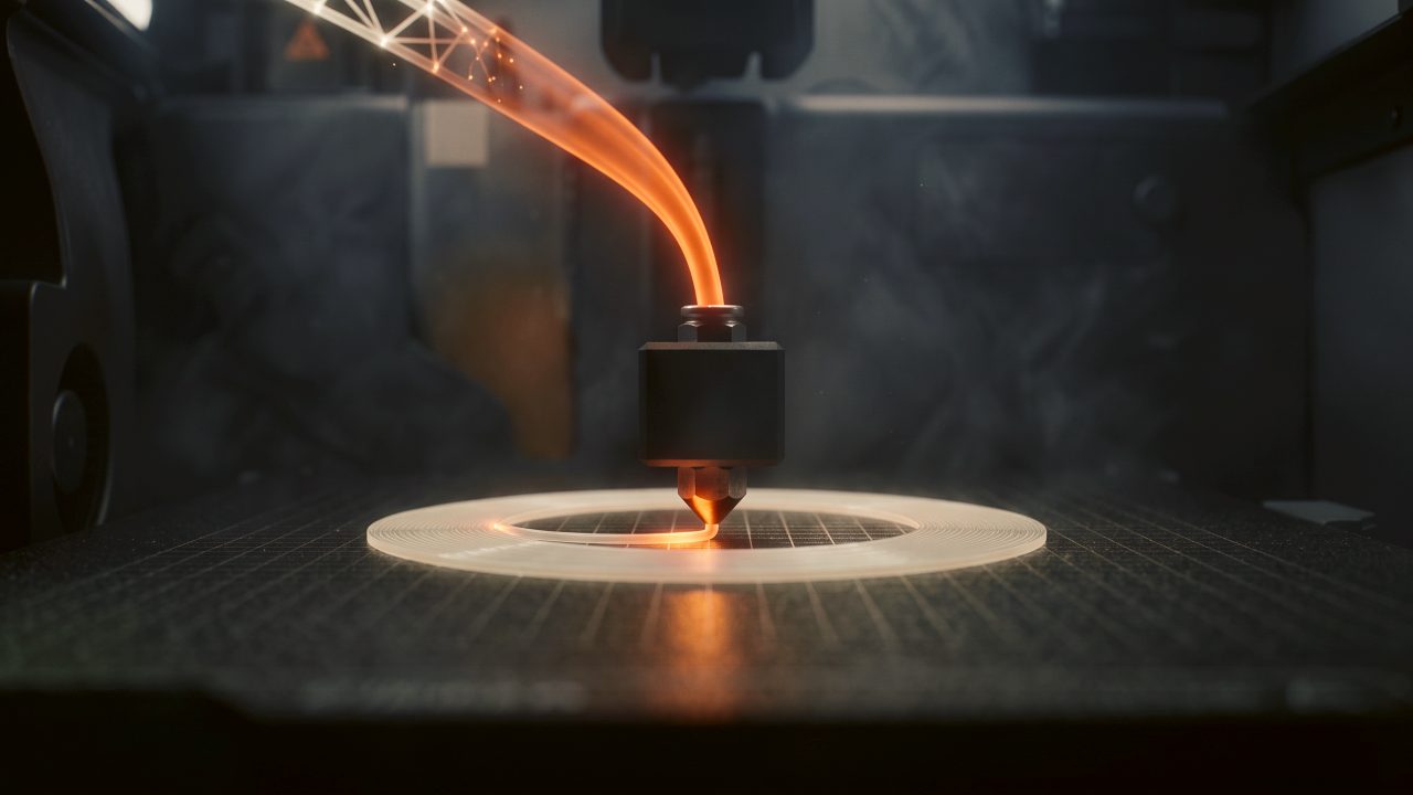 The lattice becomes molten filament feeding a nozzle that prints a ring